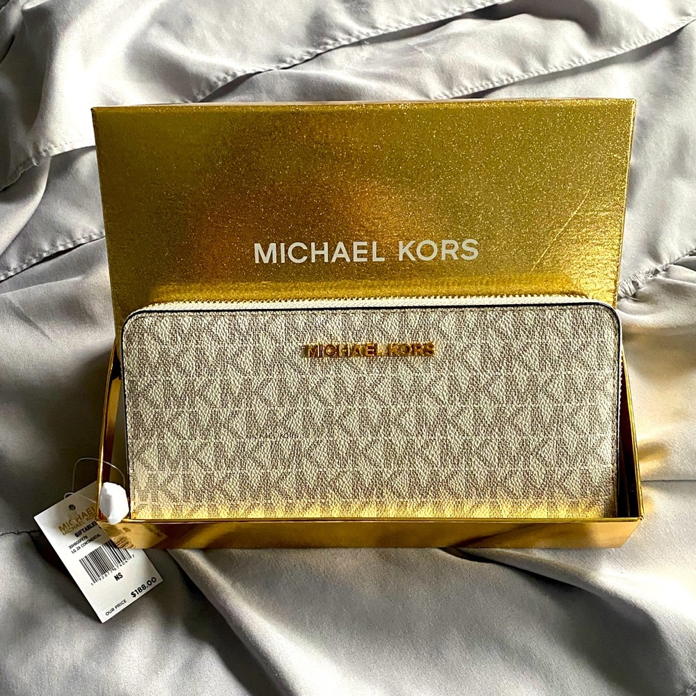 Brand new Michael Kors wallet. LG ZA Continental with tags and box.